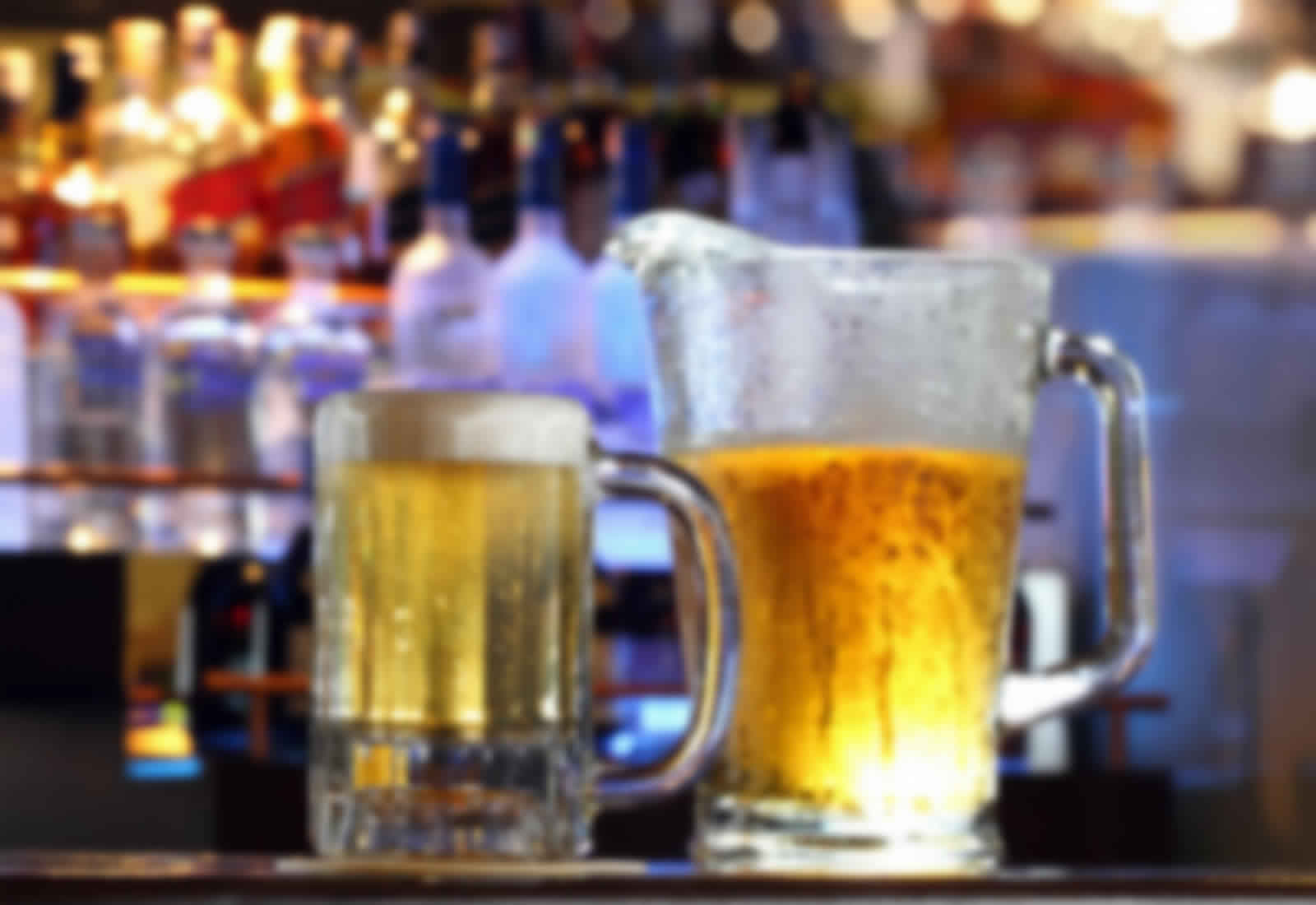 Beer Sitting on a Bar Top Counter